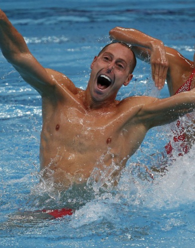 Jones and May from the US perform in the synchronised swimming mixed duet technical routine preliminary at the Aquatics World Championships in Kazan