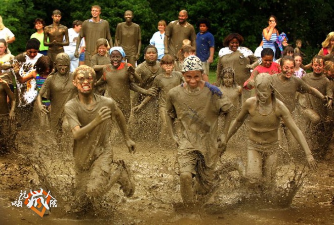 Children play during Mud Day